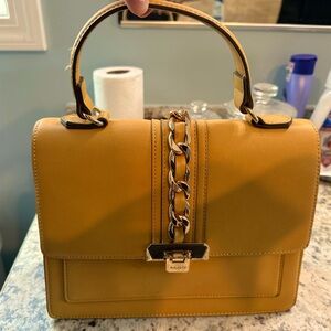 Also mustard colored purse